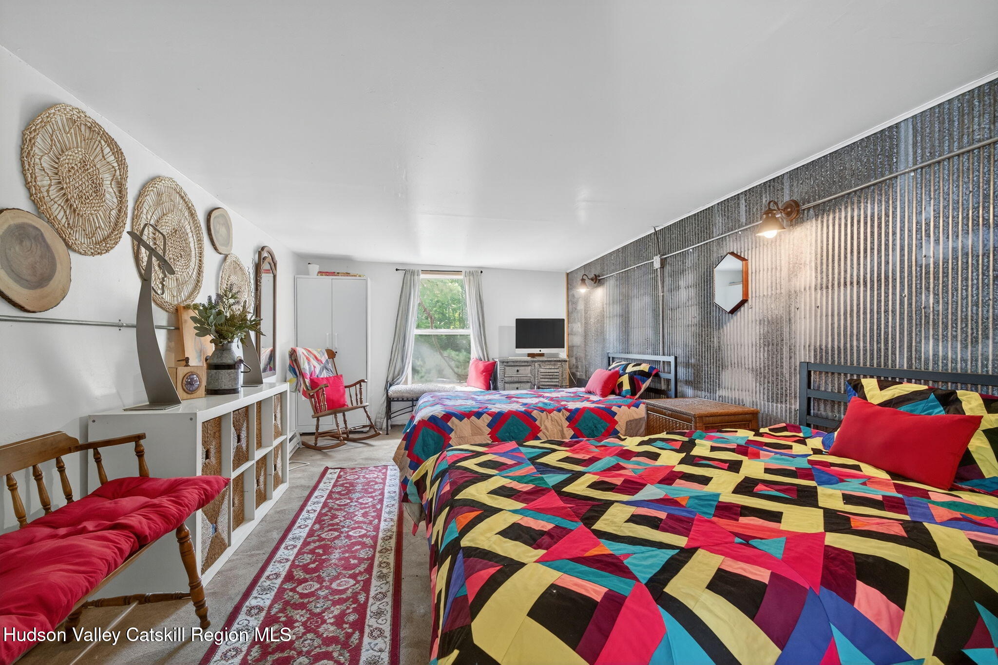 8213 Main Street Hunter, NY 12442 - Photo 30 of 44 a bed room with a bed and a book shelf