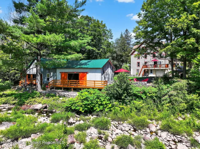 a house view with a backyard space