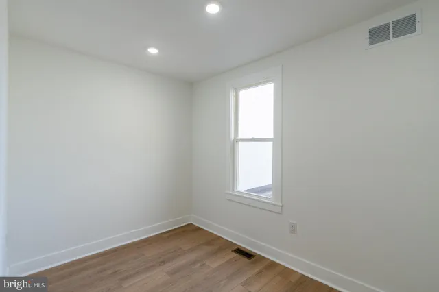 a view of small space with wooden floor