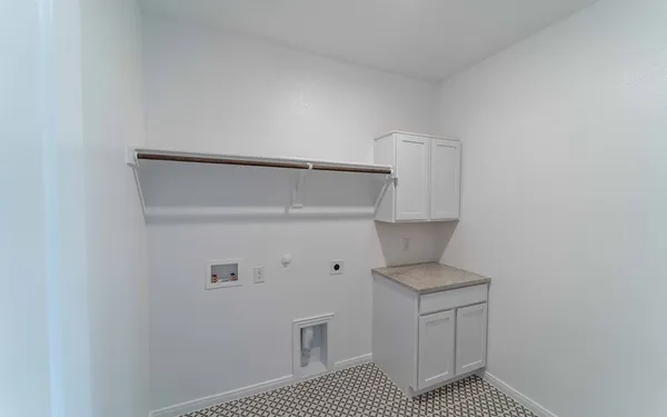 a view of hallway with washer and dryer