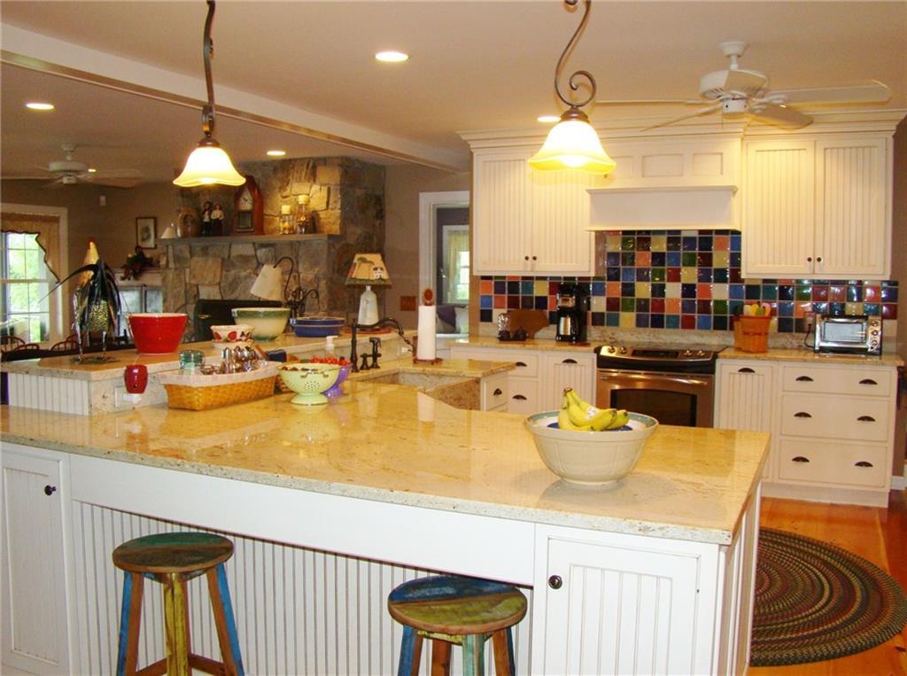 98 Pine Rock Road Naples, ME 04055 - Photo 8 of 35 This kitchen is covered in...