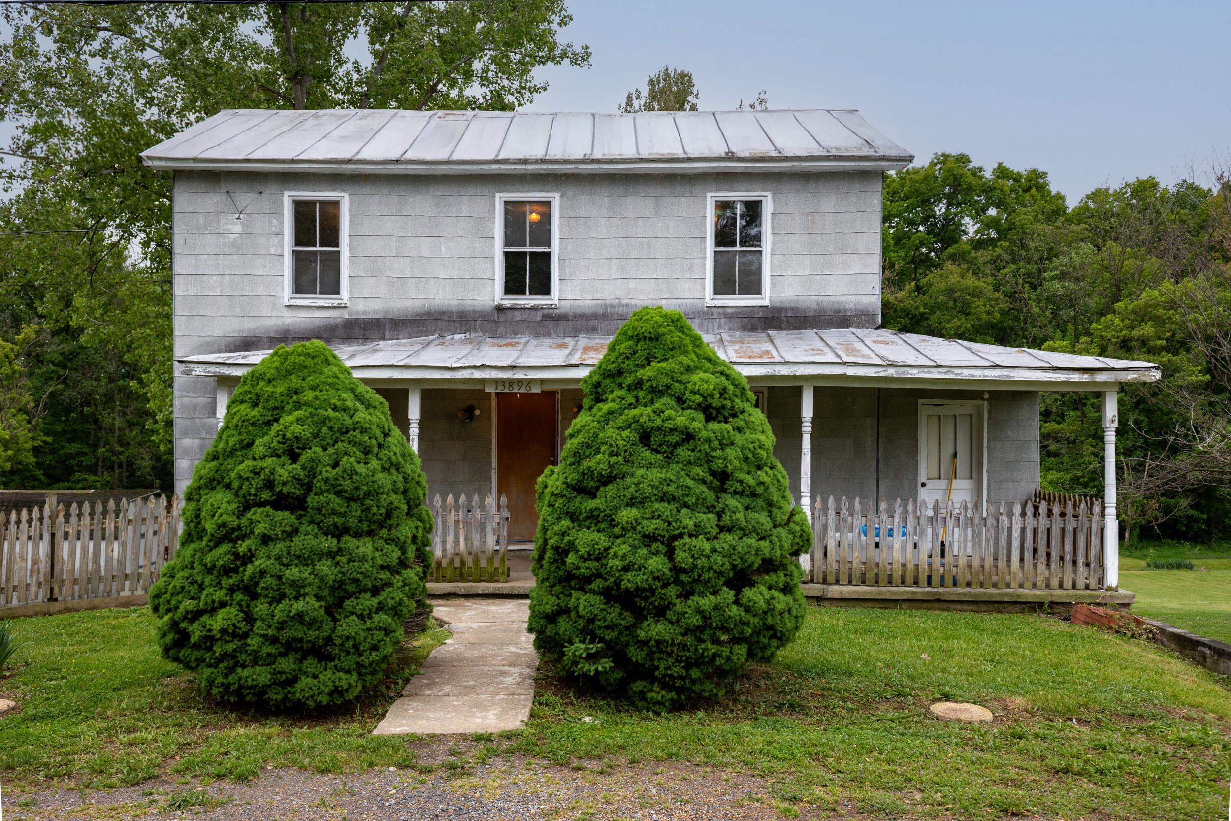13896 Rockingham Pike Elkton, VA 22827 - Photo 1 of 60 a front view of a house with garden