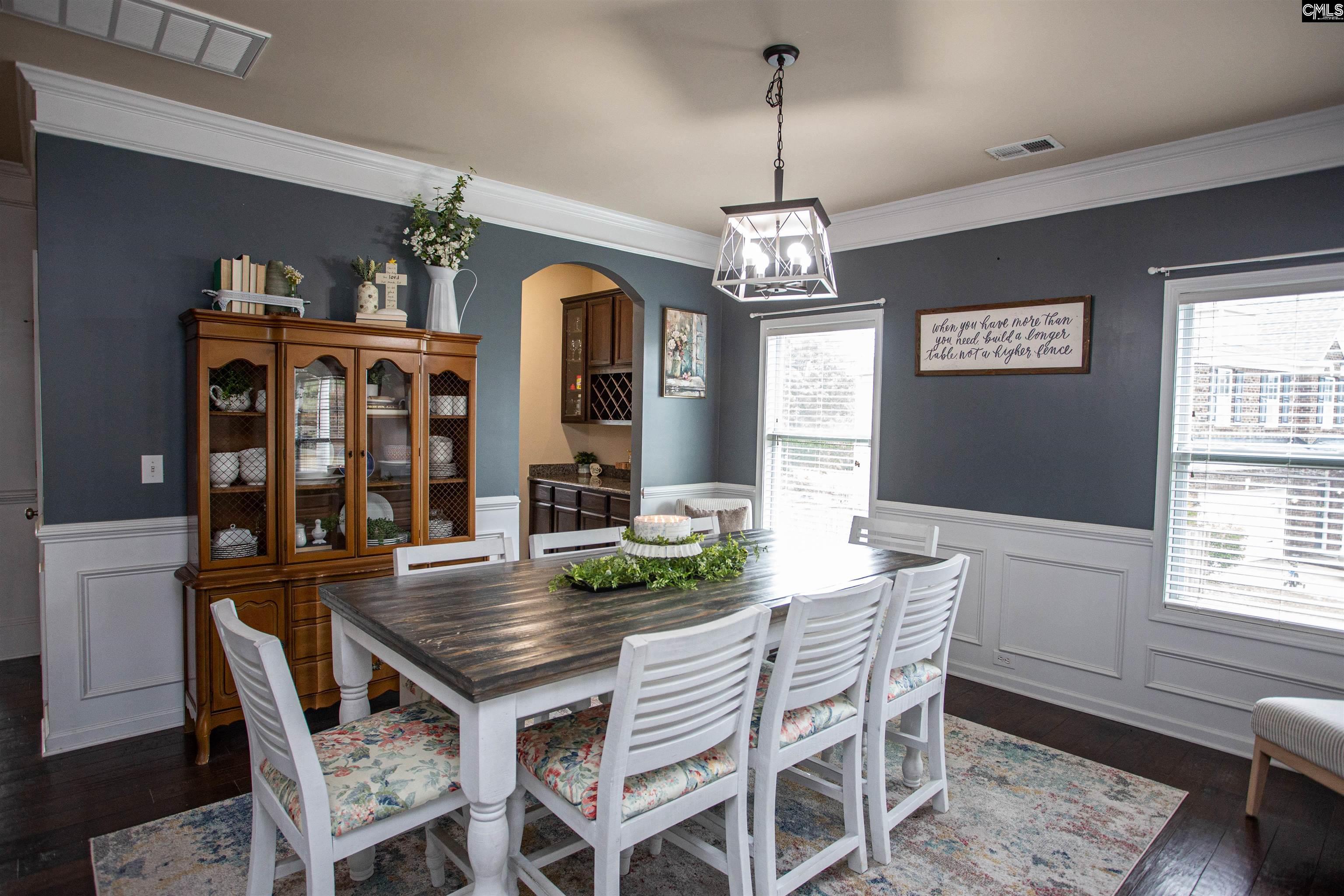 7 Templand Court Elgin, SC 29045 - Photo 7 of 47 a view of a dining room with furniture window and wooden floor