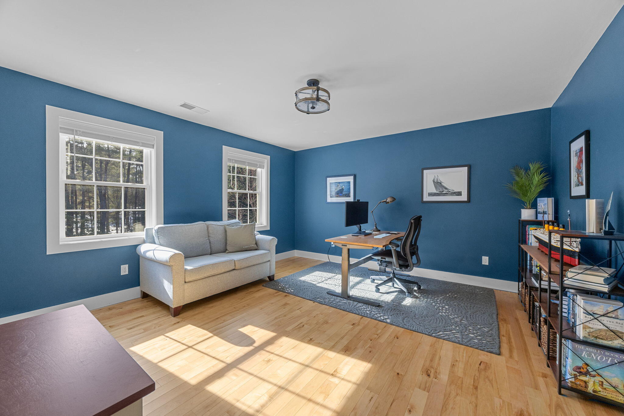 174 Cross Neck Road Marion, MA 02738 - Photo 24 of 41 a living room with furniture and a flat screen tv with wooden floor
