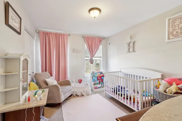 a bedroom with furniture and a bed