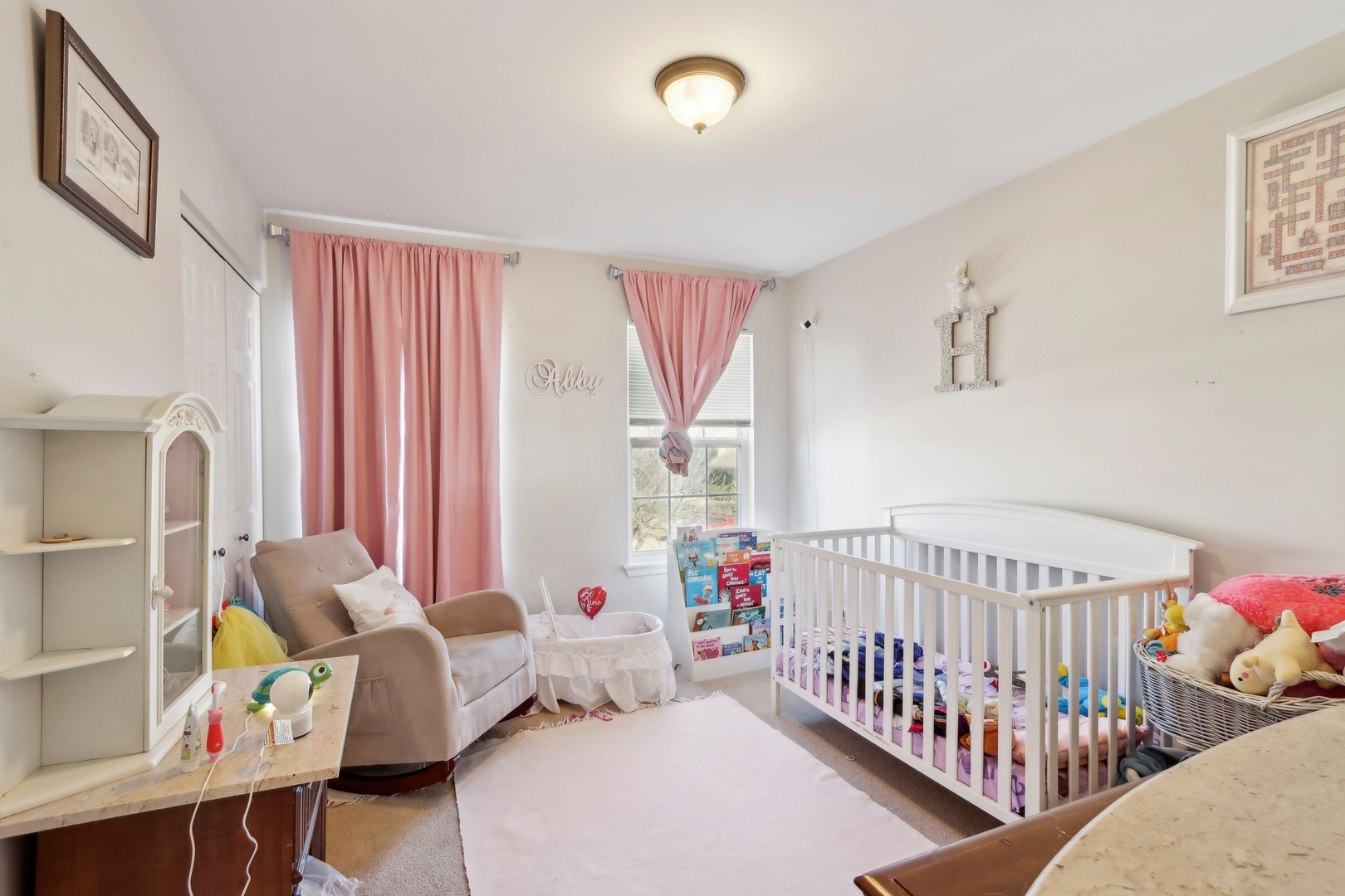 3304 Alyssa Street Plano, IL 60545 - Photo 15 of 30 a bedroom with furniture and a bed