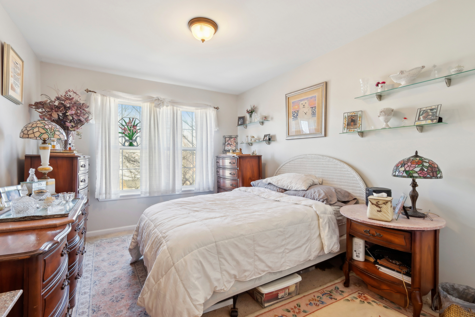 3304 Alyssa Street Plano, IL 60545 - Photo 18 of 30 a bedroom with a bed and wooden floor