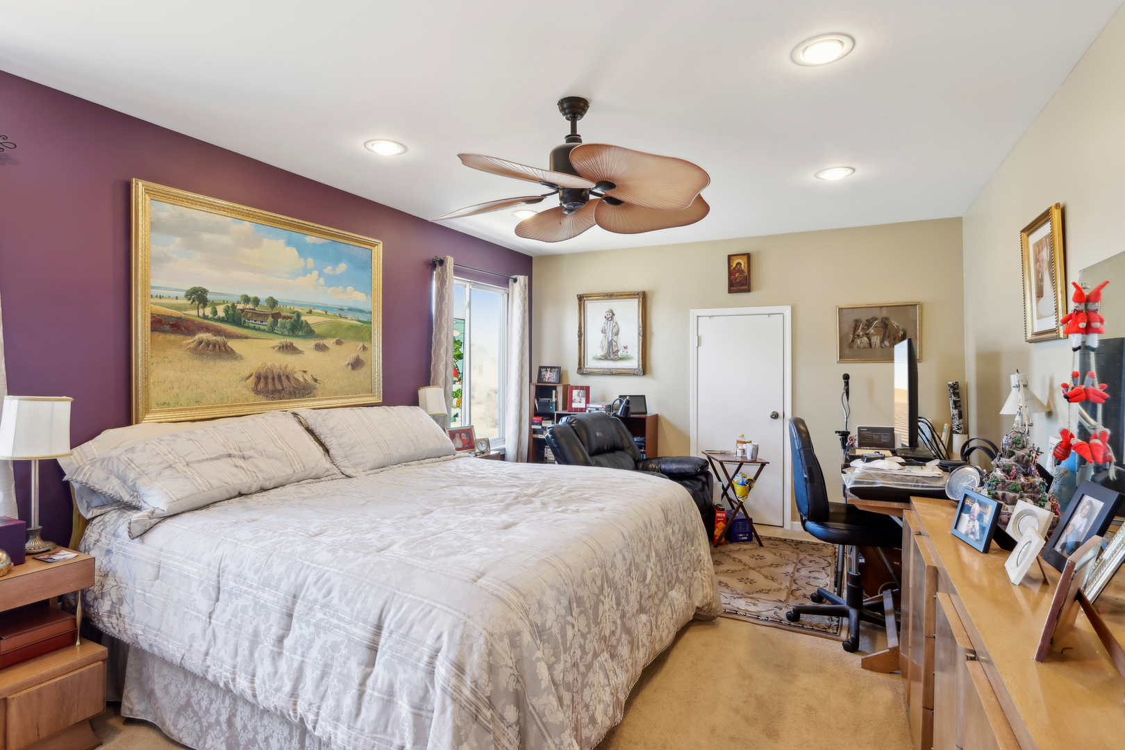 3304 Alyssa Street Plano, IL 60545 - Photo 23 of 30 a bedroom with a bed and a chandelier