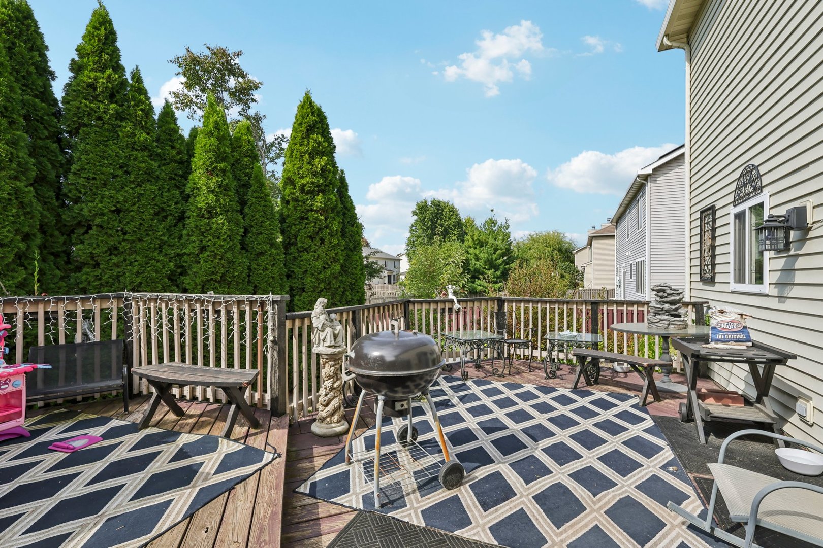 3304 Alyssa Street Plano, IL 60545 - Photo 25 of 30 a view of a chairs and table on the deck