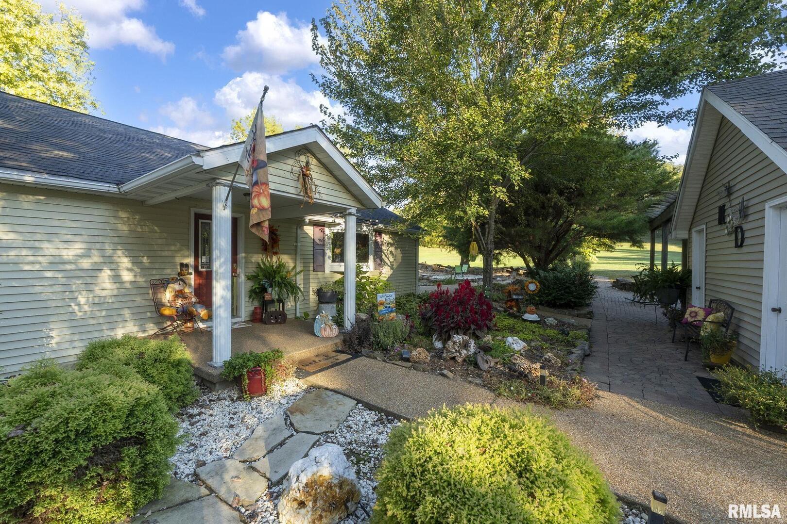 1810 Berryville Road Jonesboro, IL 62952 - Photo 5 of 60 a house view with a outdoor space