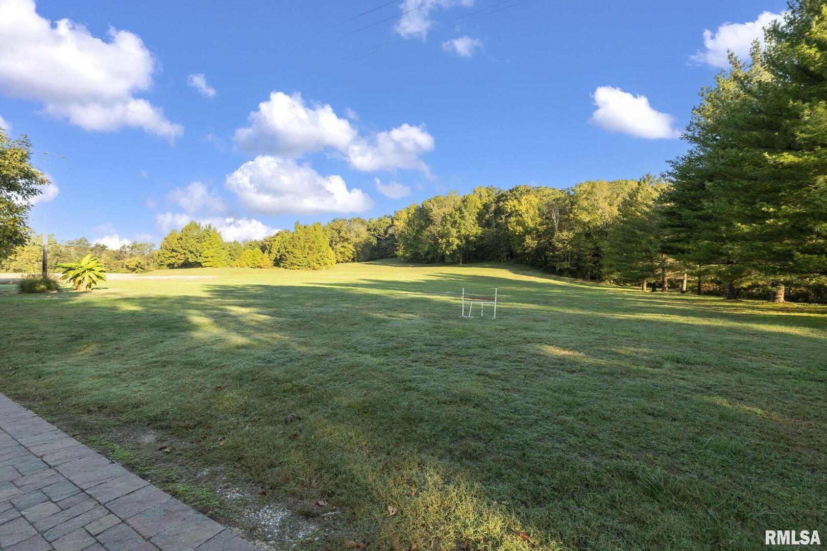 1810 Berryville Road Jonesboro, IL 62952 - Photo 54 of 60 a view of a golf course with a house