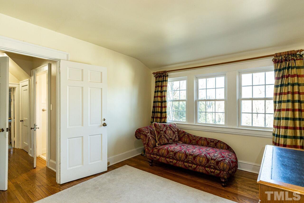 101 East Riverside Drive Smithfield, NC 27577 - Photo 33 of 38 a bedroom with a bed and a window
