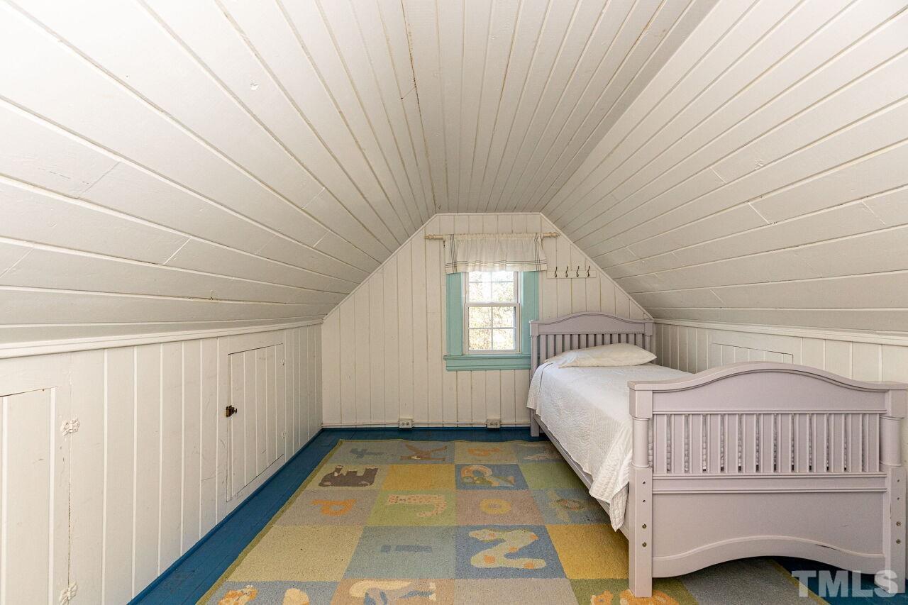 101 East Riverside Drive Smithfield, NC 27577 - Photo 34 of 38 a bedroom with a bed and window