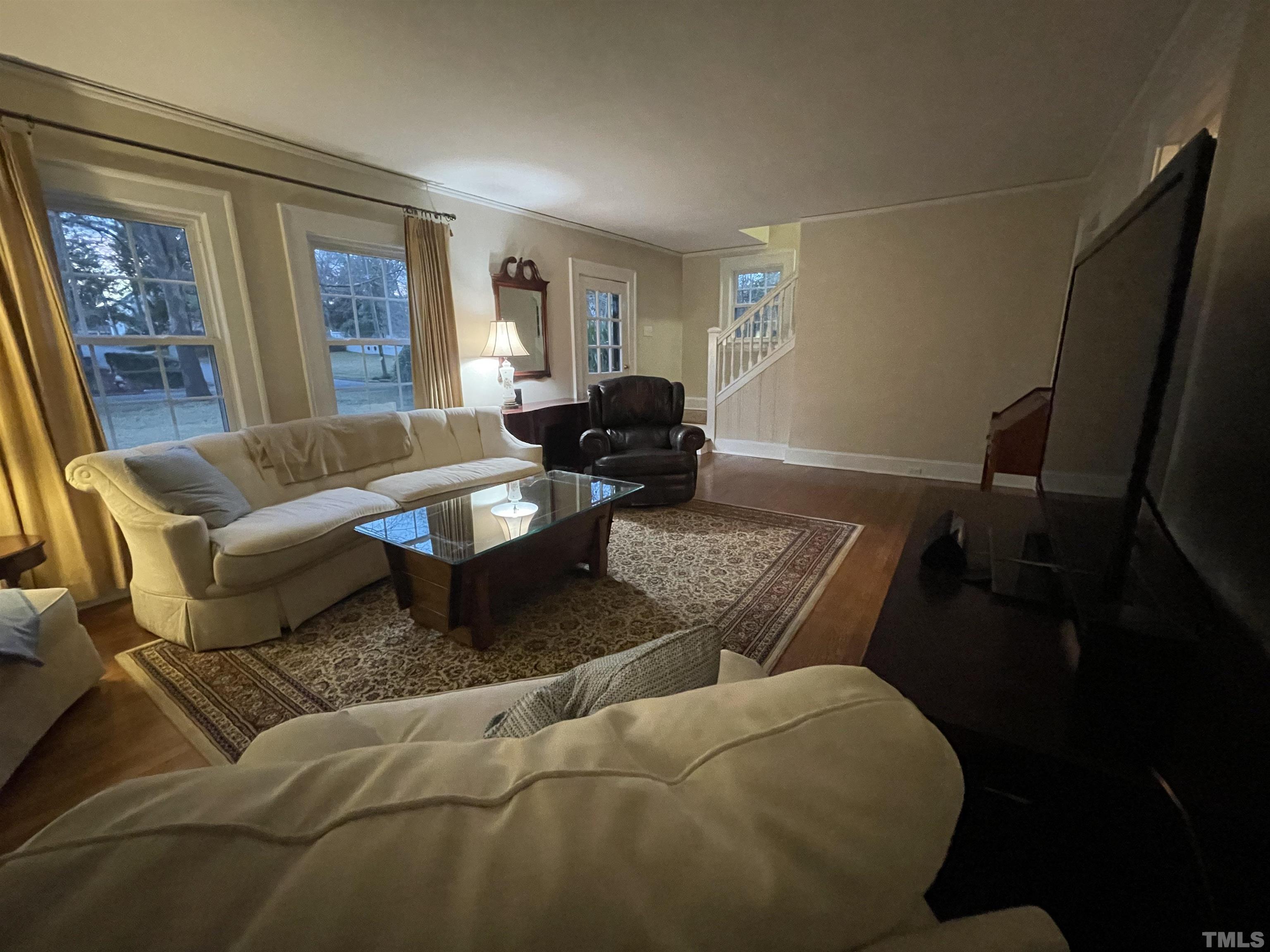 101 East Riverside Drive Smithfield, NC 27577 - Photo 10 of 38 a living room with furniture and a window