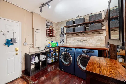 a utility room with dryer and washer
