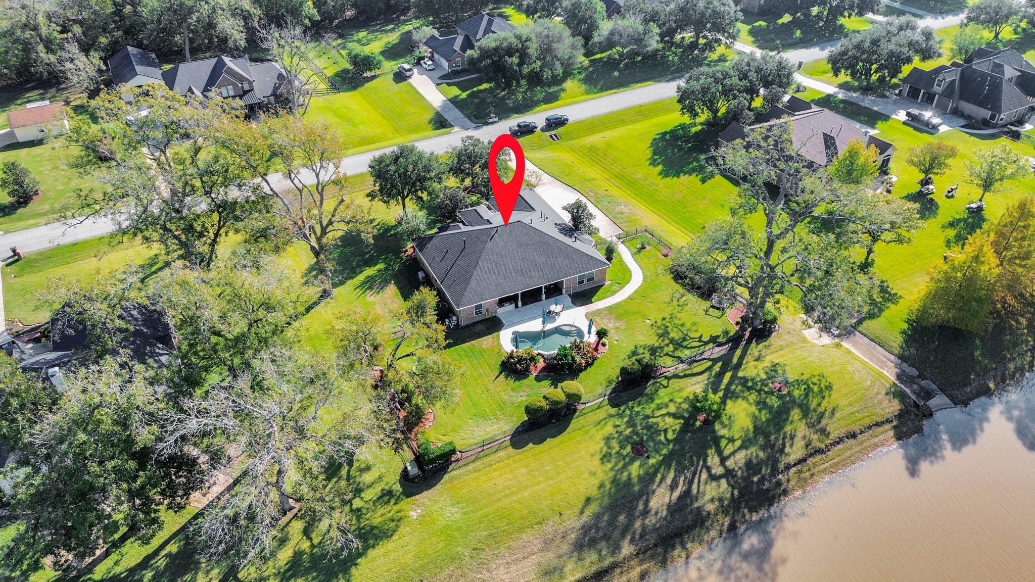 3511 River Bend Drive Rosenberg, TX 77471 - Photo 2 of 50 an aerial view of a house with swimming pool and large trees