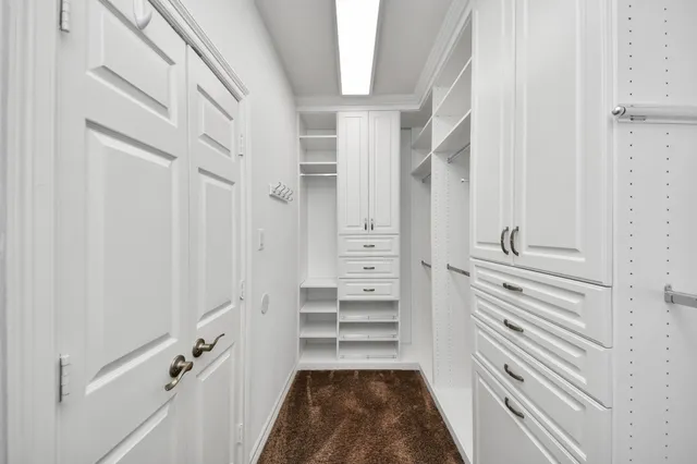 a spacious bathroom with a bathtub and a shower