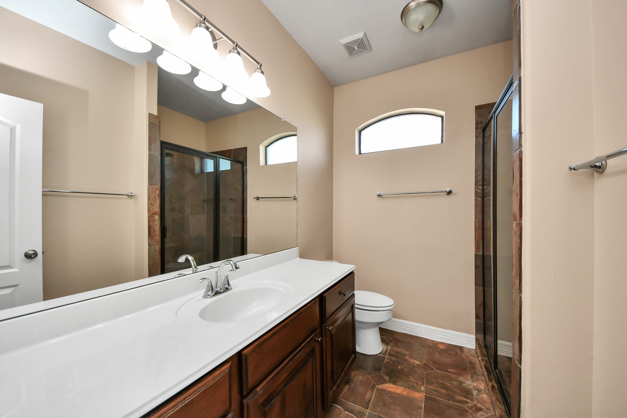 3511 River Bend Drive Rosenberg, TX 77471 - Photo 29 of 50 a bathroom with a sink a toilet and a mirror