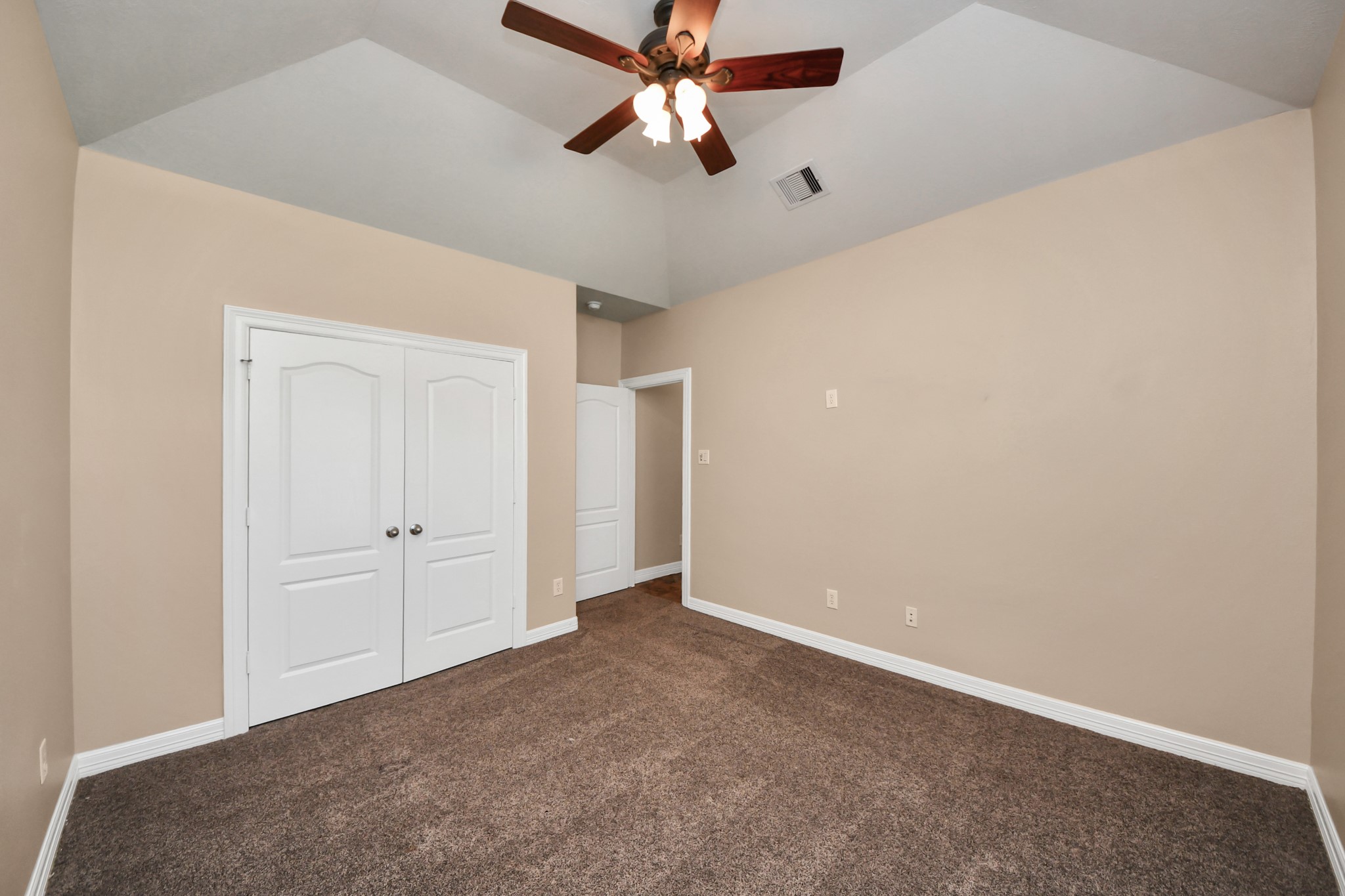 3511 River Bend Drive Rosenberg, TX 77471 - Photo 30 of 50 an empty room with chandelier fan