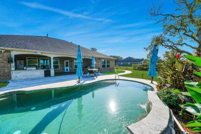 a view of a backyard with a patio