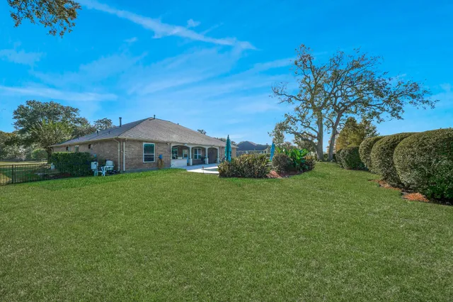 a view of a kitchen with a sink and a window