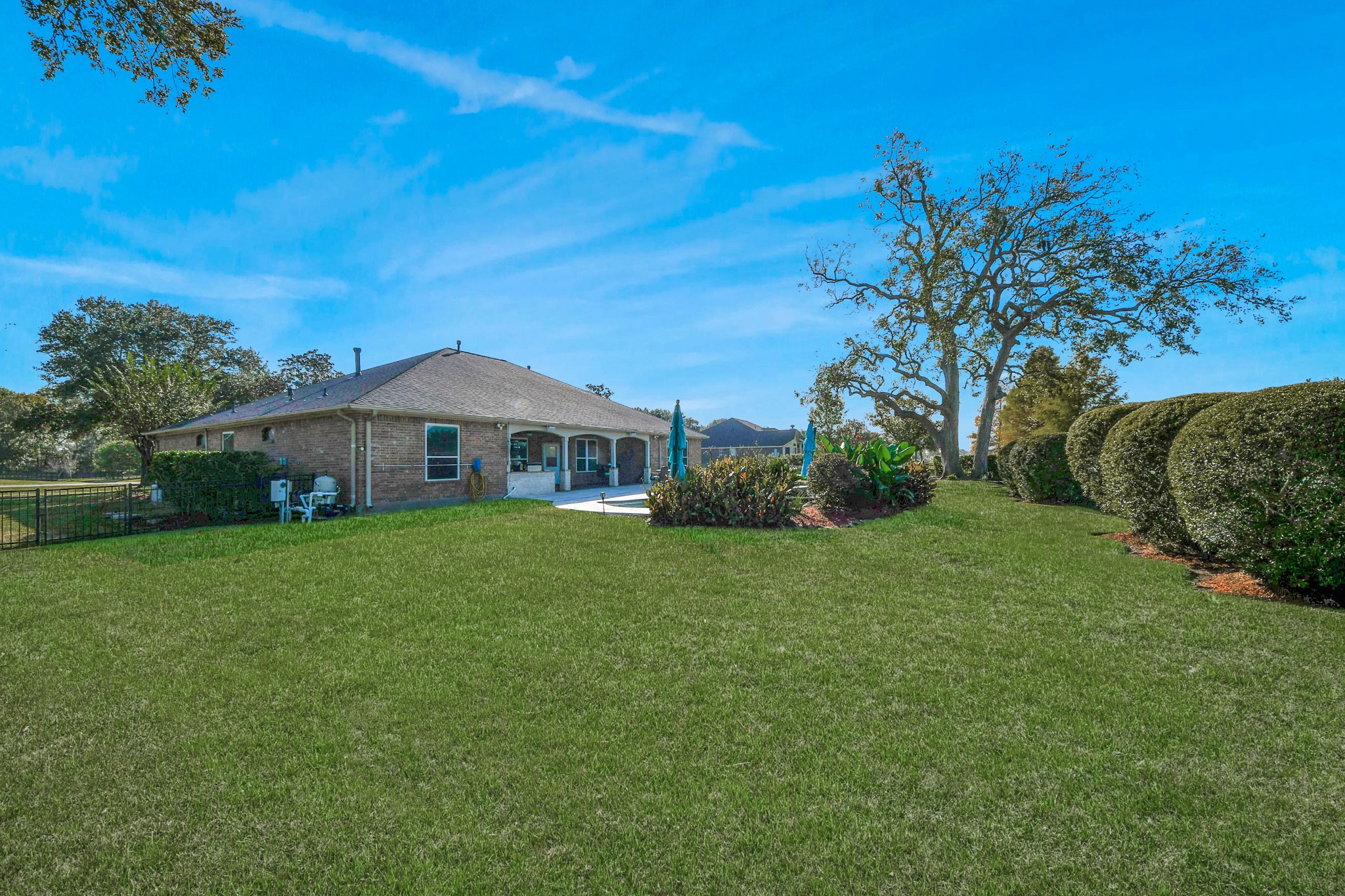 3511 River Bend Drive Rosenberg, TX 77471 - Photo 43 of 50 a front view of a house with a garden