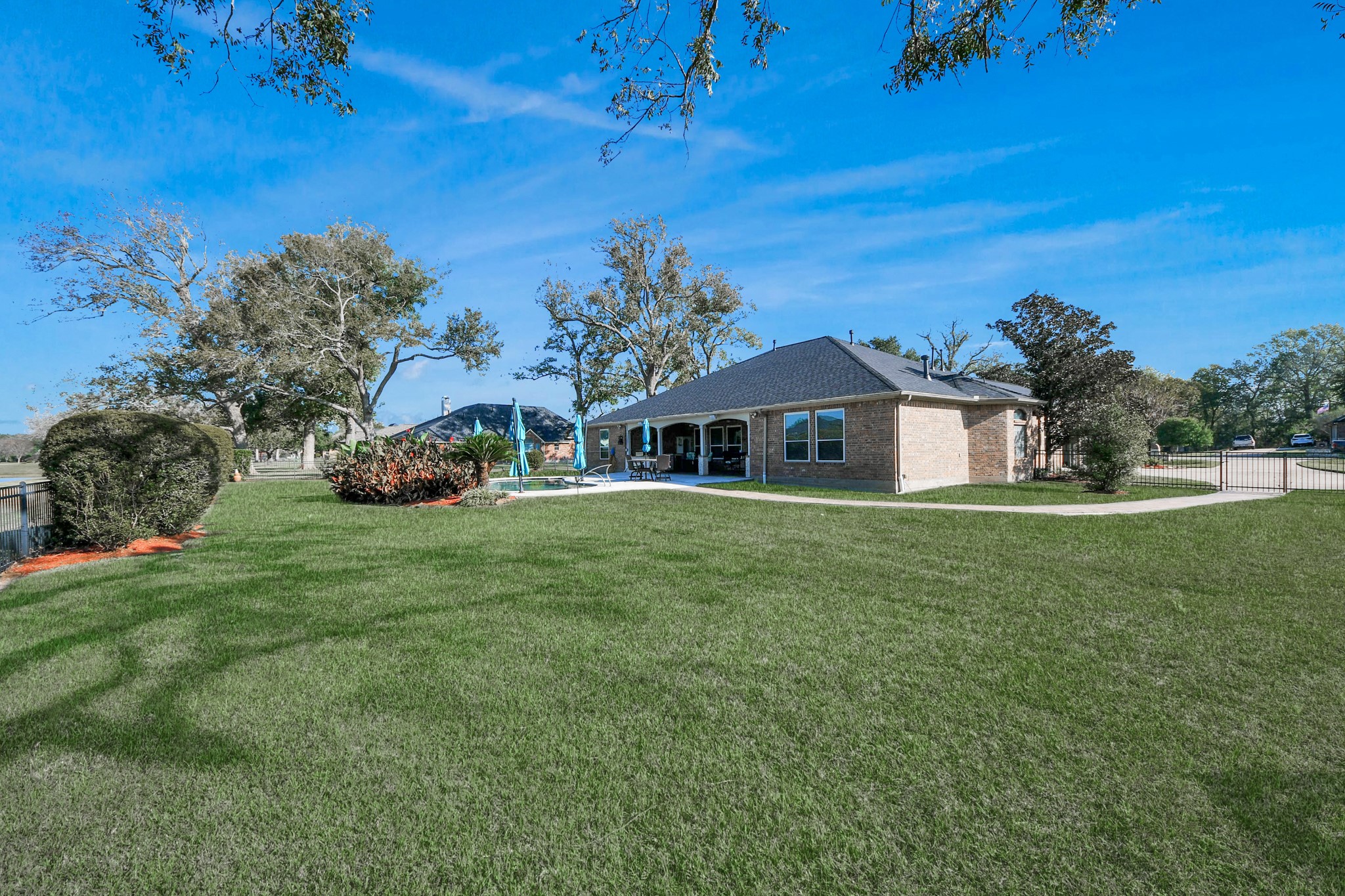 3511 River Bend Drive Rosenberg, TX 77471 - Photo 44 of 50 a front view of a house with a garden