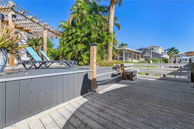 a view of a house with outdoor space and sitting area