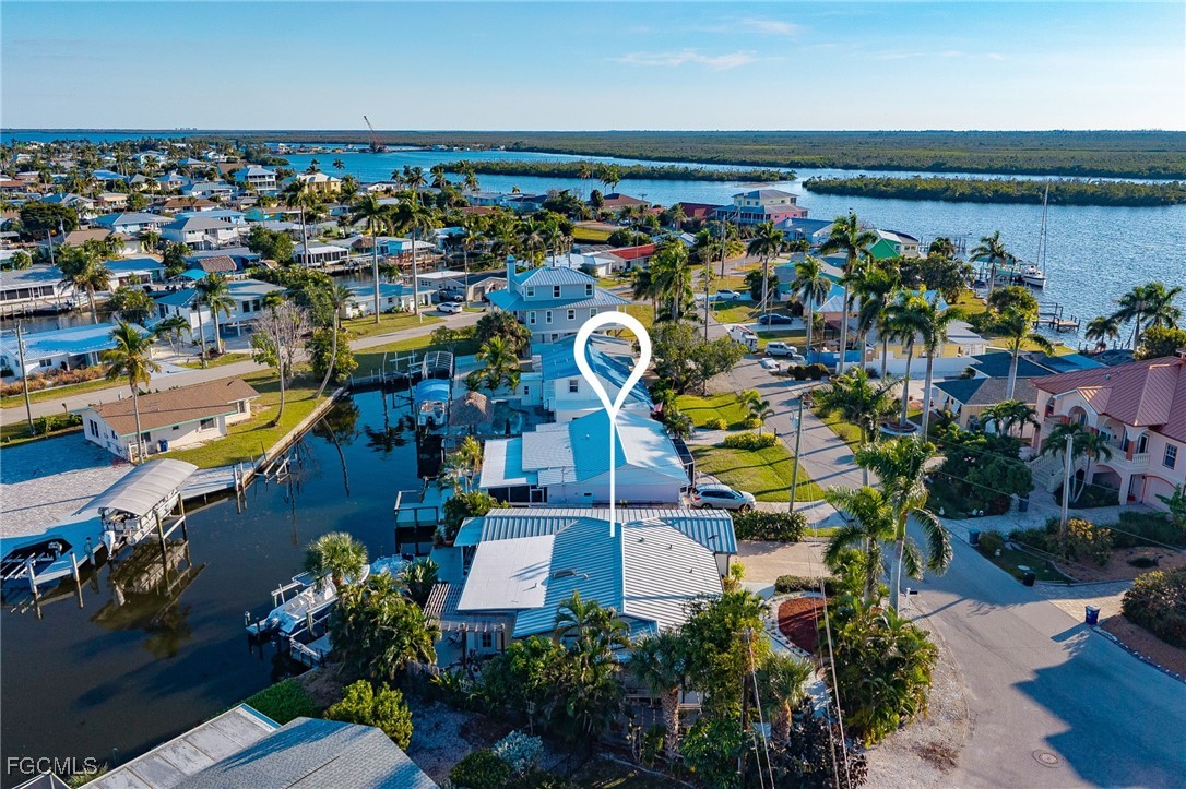 11860 Island Avenue Matlacha, FL 33993 - Photo 36 of 41 an aerial view of a building and yard