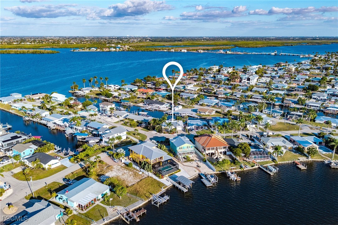 11860 Island Avenue Matlacha, FL 33993 - Photo 37 of 41 a view of swimming pool with an outdoor space and seating area