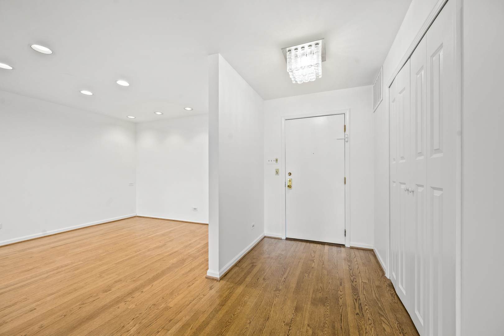 1125 Lake Cook Road, Unit 405 Northbrook, IL 60062 - Photo 4 of 18 a view of a hallway with wooden floor