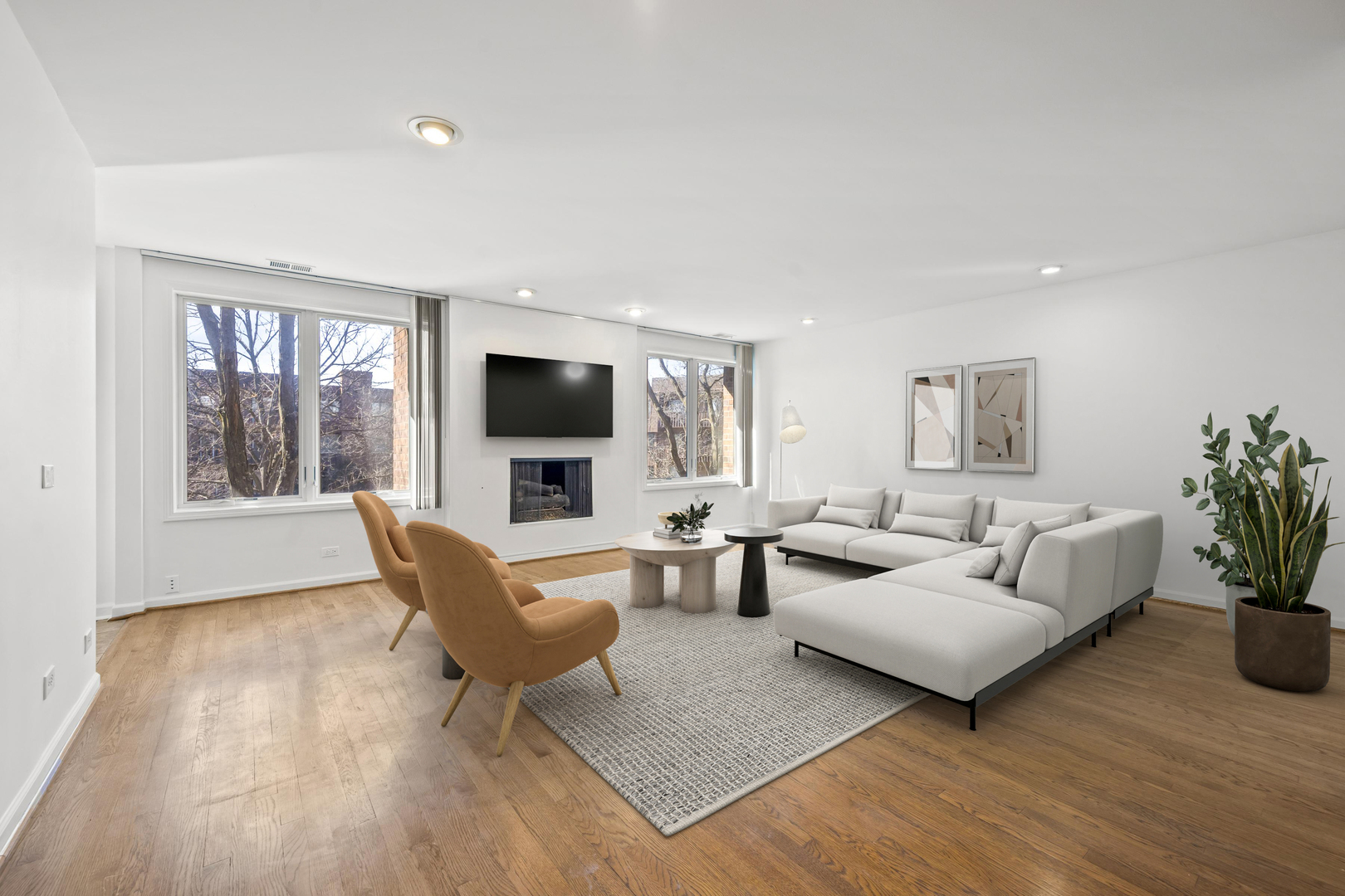 1125 Lake Cook Road, Unit 405 Northbrook, IL 60062 - Photo 5 of 18 a living room with furniture flat screen tv and a window