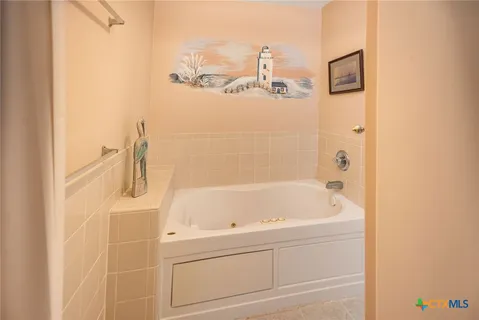 a room with a window and washer