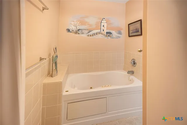 a room with a window and washer