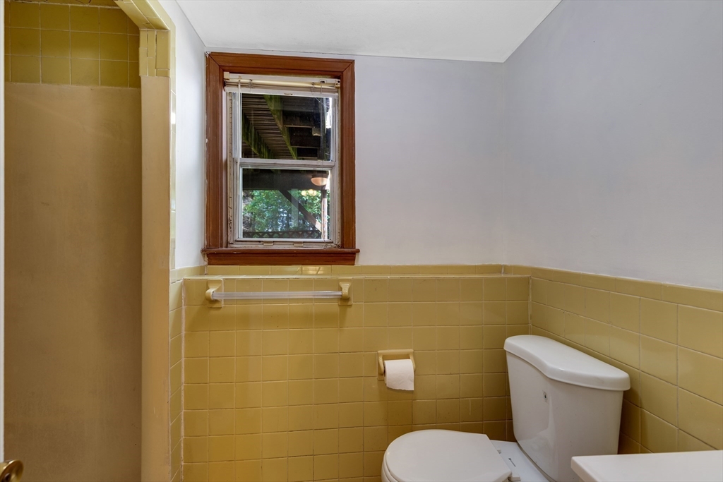 15 Conestoga Road Lexington, MA 02421 - Photo 22 of 31 a bathroom with a toilet and a sink