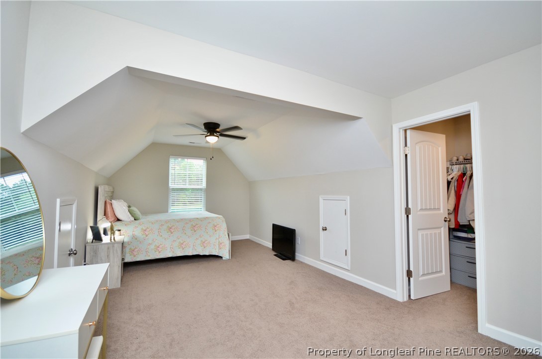 1865 John B Carter Road Fayetteville, NC 28312 - Photo 29 of 49 a bedroom with furniture and white walls