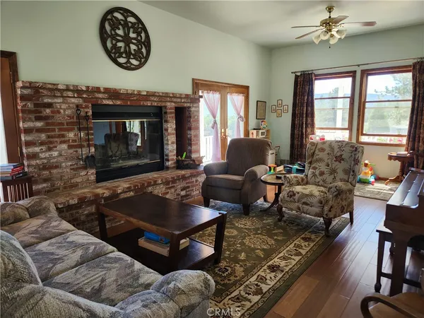 a bedroom with a bed and a fireplace