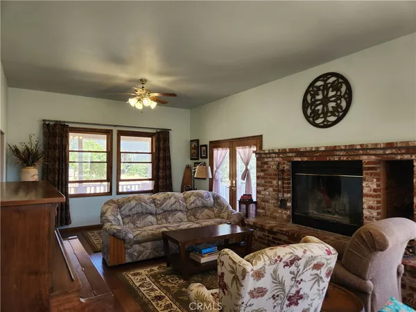 a room with furniture and flat screen tv
