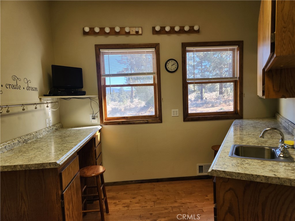 1014 Dusty Road Frazier Park, CA 93225 - Photo 22 of 40 a room with furniture and flat screen tv