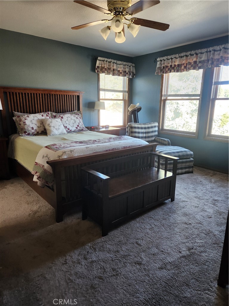 1014 Dusty Road Frazier Park, CA 93225 - Photo 26 of 40 a bedroom with a bed and window
