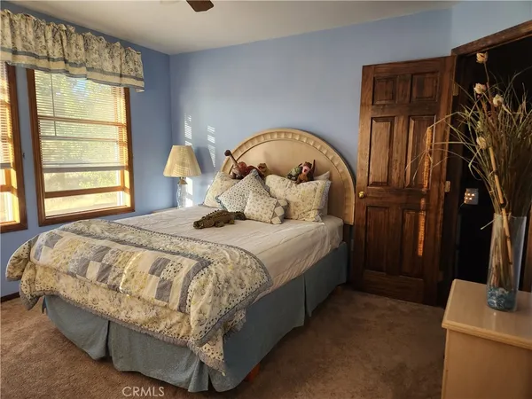 a view of hall way with furniture