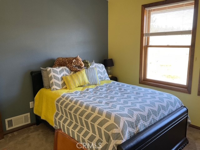 1014 Dusty Road Frazier Park, CA 93225 - Photo 31 of 40 a bedroom with a bed and a window