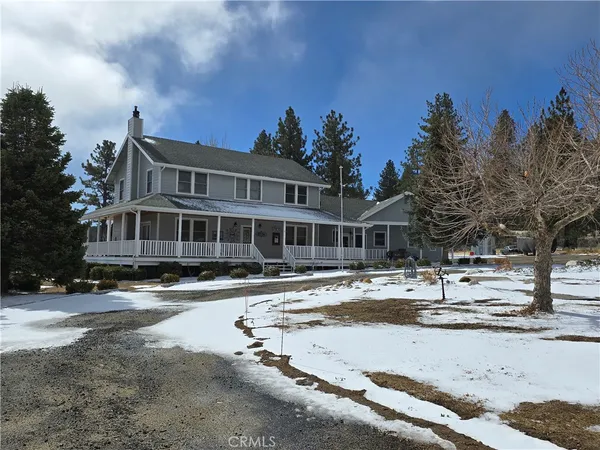 a view of water and mountain in the background