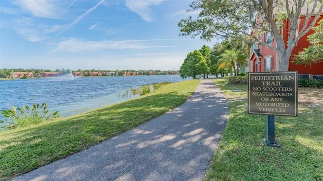an aerial view of a house with outdoor space and street view