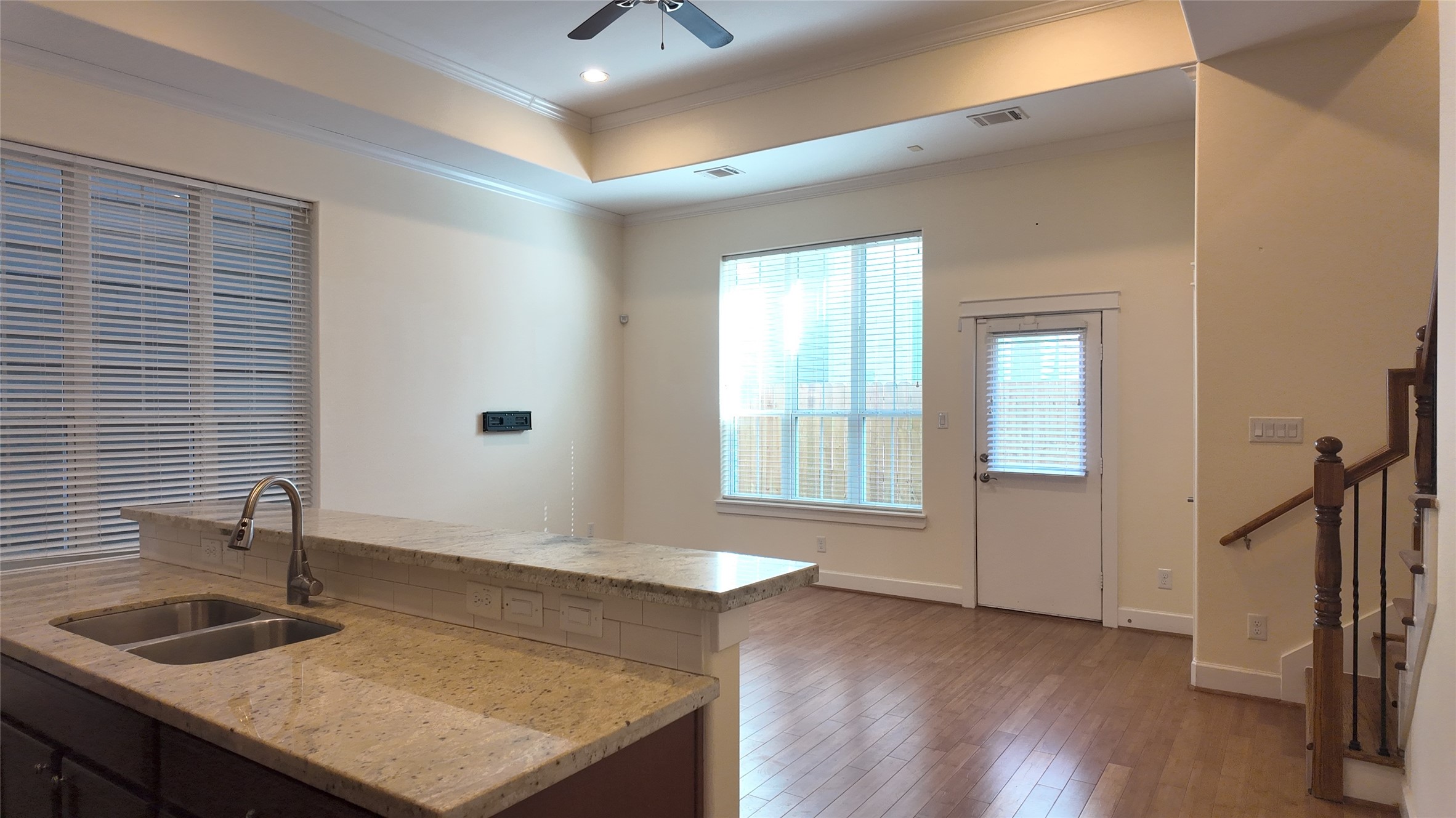 902 West 20th Street, Unit B Houston, TX 77008 - Photo 5 of 15 a bathroom with a granite countertop sink and a mirror