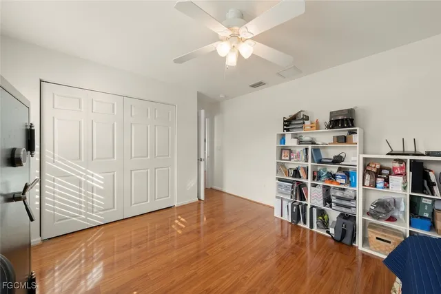 a view of a livingroom with empty shelves