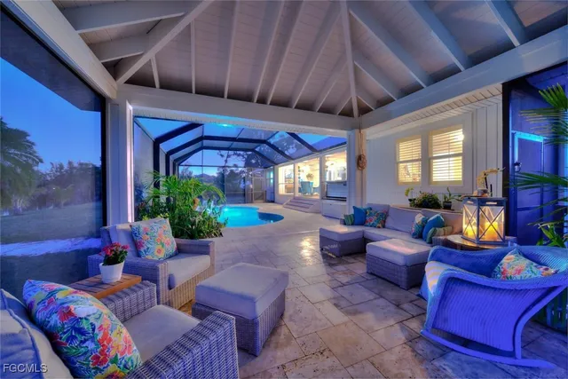 a view of a swimming pool with a patio