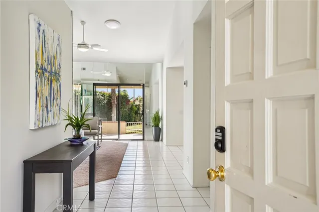 a living room with a large window and table