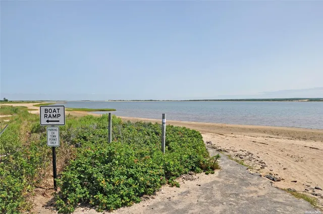 a view of a lake with beach and ocean view