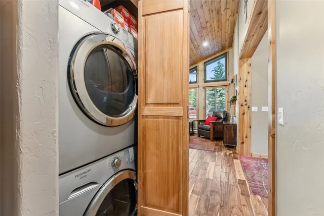 a view of a storage & utility room with a washer dryer